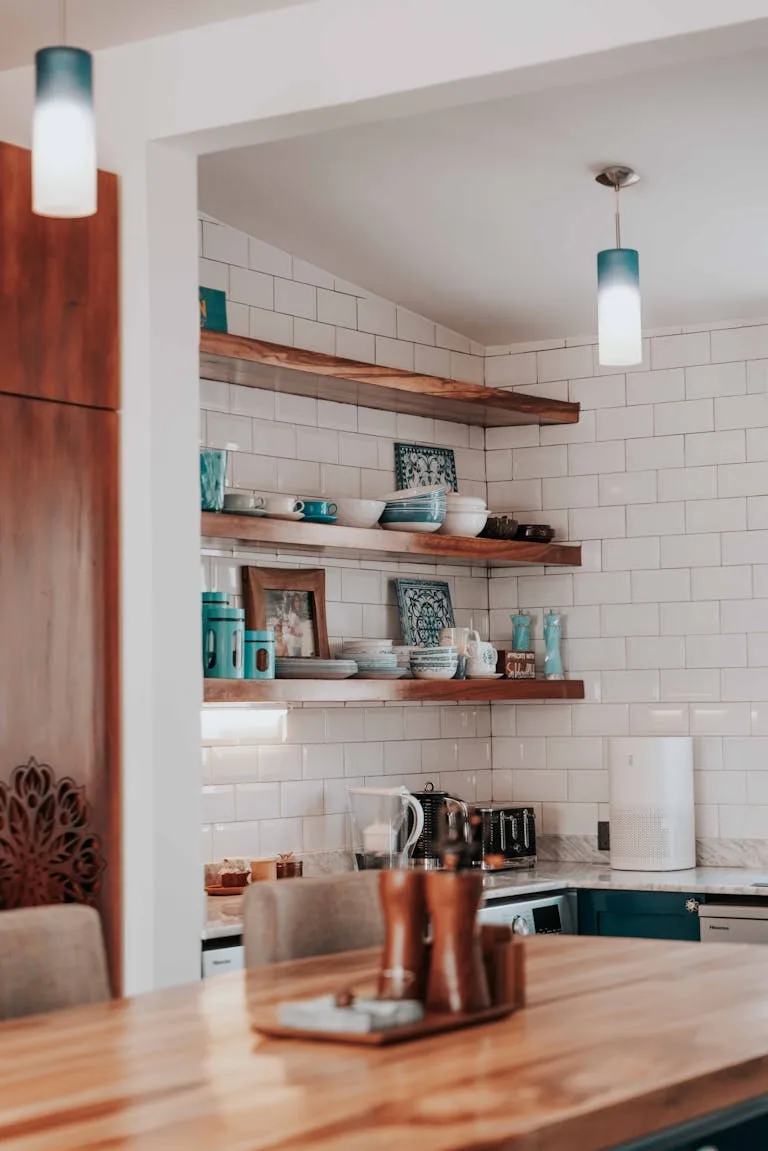 Plates and Bowls on Shelves in a Kitchen