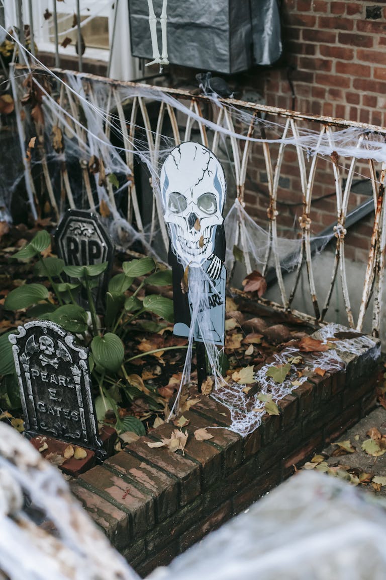 Yard decorated for Halloween with graves